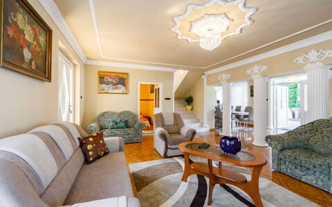 Big Thuja: Picture Frame, Furniture, Table, Couch, Building, Living Room, Houseplant, Architecture, Chair, Interior Design