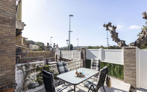 Mora Igor: Sky, Property, Table, Furniture, Building, Flowerpot, Chair, Plant, Outdoor Table, Outdoor Furniture