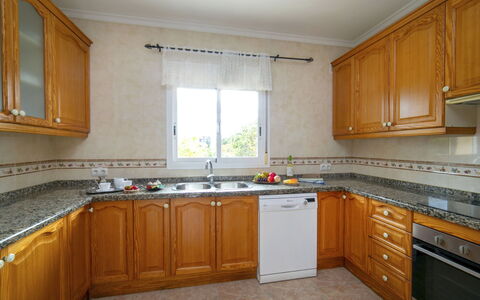 Solpadel: Kitchen, Kitchen Appliance, Countertop, Major Appliance, Cabinetry, Flooring, Interior Design, Kitchen Sink, Floor, Stove