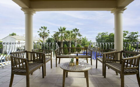 Villa Delfín: Sky, Property, Shade, Botany, Interior Design, Architecture, Plant, Outdoor Furniture, Leisure, Tree