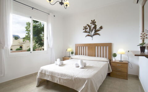 Villa Delfín: Furniture, Property, Plant, White, Wood, Lighting, Interior Design, Window, Decoration