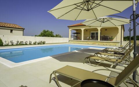 Nisa: Sky, Building, Light, Plant, Swimming Pool, Shade, Outdoor Furniture, Chair, Sunlounger, Leisure