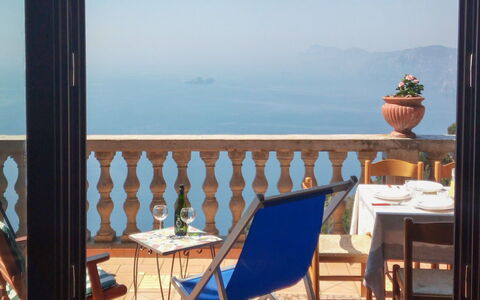 La Dea della Stella Polare: Water, Sky, Furniture, Property, Table, Chair, Building, Azure, Shade, Outdoor Furniture