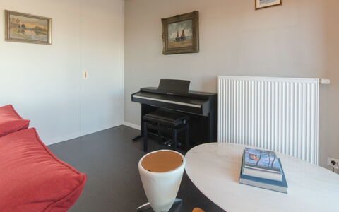 Turquoise Duplex Appartment: Table, Picture Frame, Furniture, Property, Building, Desk, Wood, Tableware, Chair, Countertop