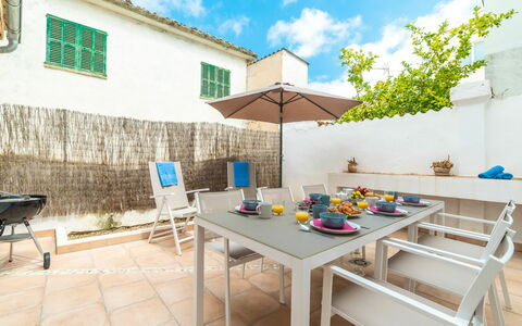 Can Monjo: Cloud, Sky, Table, Building, Property, Furniture, Plant, House, Window, Outdoor Furniture