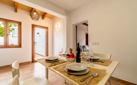 Can Monjo: Table, Furniture, Property, Building, Window, Chair, Wood, Interior Design, House, Tableware