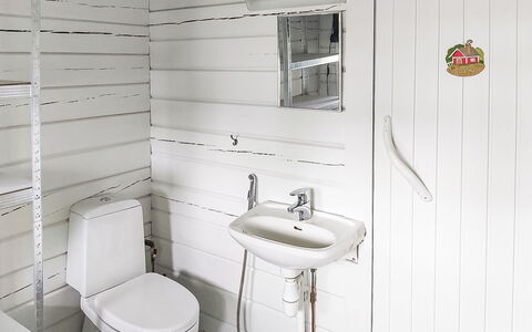 Villa Koivumäki: Plumbing Fixture, Toilet Seat, Bathroom, Flooring, Toilet, Floor, Sink, Plumbing, Bathroom Sink, Tap