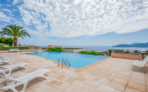 La Croix des Gardes: Cloud, Water, Sky, Swimming Pool, Plant, Azure, Seaside Resort, Outdoor Furniture, Coastal And Oceanic Landforms, Tree