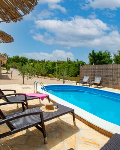 Nina: Water, Cloud, Sky, Building, Property, Plant, Swimming Pool, Azure, Shade, Outdoor Furniture