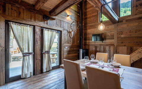 Chalet les Combes: Property, Table, Window, Wood, Interior Design, Building, Chair, Architecture, Floor, Wall
