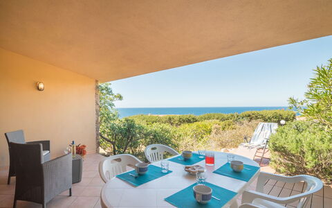 Costa Paradiso 706: Furniture, Plant, Table, Building, Sky, Chair, Azure, Shade, Architecture, Interior Design