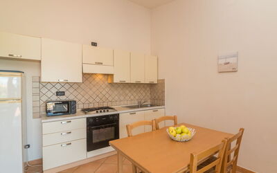 Corbezzolo 706.2: Furniture, Cabinetry, Countertop, Table, Wood, Interior Design, Drawer, Kitchen Stove, Kitchen, Building