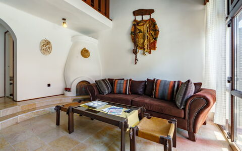Suzy: Furniture, Property, Couch, Building, Table, Wood, Interior Design, Comfort, Picture Frame, Living Room