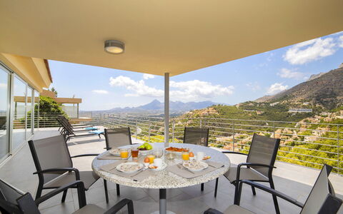 La Estrella: Table, Cloud, Furniture, Tableware, Sky, Plant, Chair, Shade, Interior Design, Outdoor Furniture