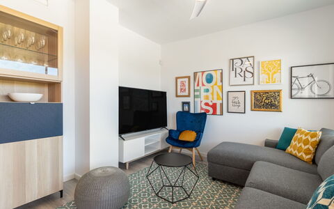 White Stones: Property, Picture Frame, Lighting, Couch, Interior Design, Comfort, Yellow, Flooring, Floor, Living Room