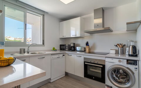 White Stones: Cabinetry, Countertop, Property, Window, Kitchen, Building, Kitchen Stove, Kitchen Sink, Sink, Washing Machine