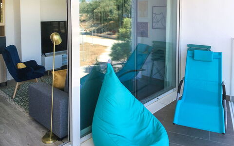 White Stones: Blue, Building, Azure, Green, Chair, Door, Shade, Interior Design, Architecture, Floor