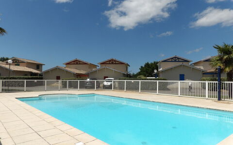 Les Jardins de L'Océan: Water, Sky, Cloud, Swimming Pool, Building, Plant, Azure, Shade, Tree, Architecture
