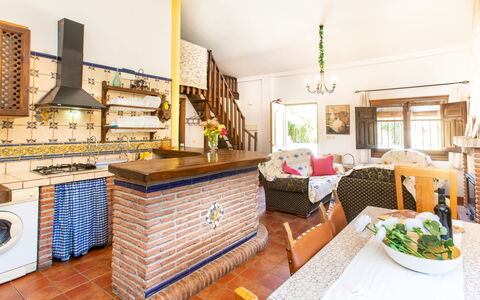 Rincón del sur: Furniture, Property, Table, Picture Frame, Lighting, Living Room, Interior Design, Wood, Couch, Floor