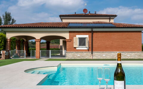 Appendino: Cloud, Sky, Water, Property, Building, Window, Bottle, Plant, Swimming Pool, Shade