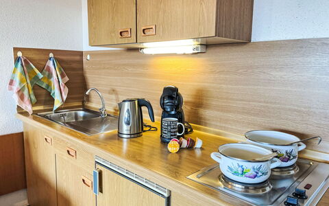 Hochstein: Countertop, Kitchen, Wood, Flooring, Kitchen Appliance, Sink, Major Appliance, Interior Design, Cabinetry, Kitchen Sink