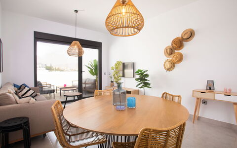 Piscis: Table, Furniture, Plant, Property, Couch, Chair, Window, Wood, Lighting, Interior Design