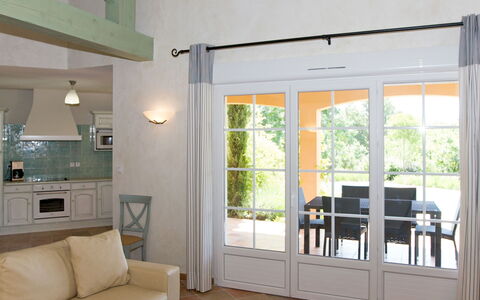 Domaine de Camiole: Couch, Wood, Comfort, Window, Living Room, Shade, Interior Design, Flooring, Floor