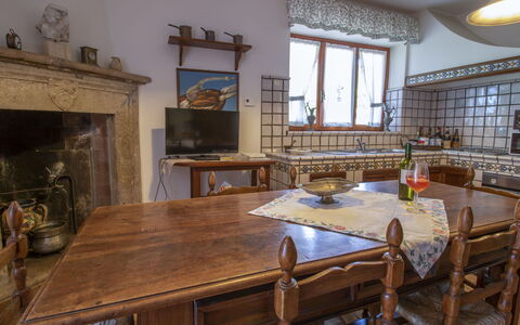 Villa Carolina: Table, Furniture, Window, Picture Frame, Wood, Building, Interior Design, House, Chair, Kitchen