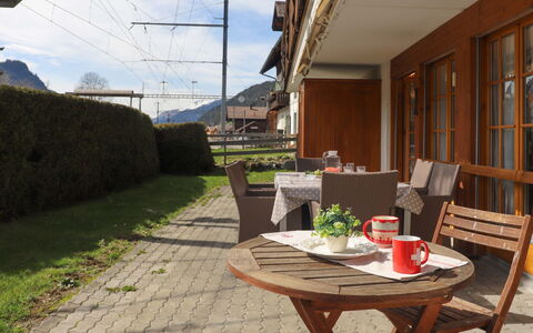 Saanen 100: Table, Plant, Furniture, Property, Flowerpot, Chair, Cloud, Houseplant, Sky, Window