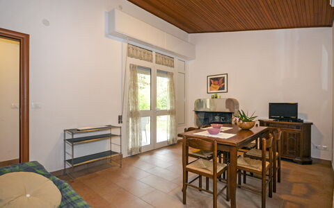 Villaggio Laura: Table, Furniture, Picture Frame, Wood, Door, Interior Design, Flooring, Floor, Building, Living Room