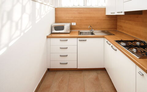 Villaggio Laura: Cabinetry, Property, Countertop, Building, Kitchen Sink, Furniture, Sink, Wood, Kitchen Stove, Kitchen