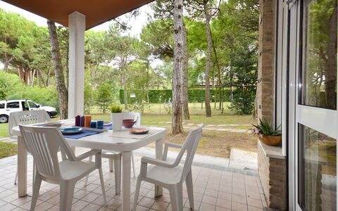 Villaggio Laura: Table, Furniture, Plant, Property, Building, Tree, Chair, Interior Design, Shade, Wood