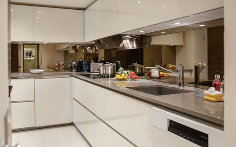 Chesa Piz Padella - St. Moritz: Kitchen, Kitchen Appliance, Countertop, Interior Design, Cabinetry, Major Appliance, Kitchen Stove, Ceiling, Sink, Stove