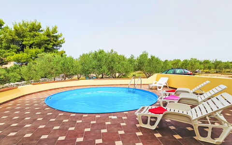 Butko: Water, Property, Sky, Tree, Outdoor Furniture, Swimming Pool, Urban Design, Plant, Flooring, Leisure