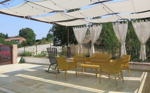 Tenuta Margherita: Plant, Furniture, Sky, Building, Shade, Tree, Table, Outdoor Furniture, Lighting, Chair
