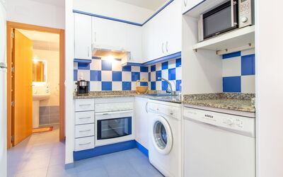 Mar de Oropesa Ii 115.2: Cabinetry, Furniture, Countertop, Kitchen Stove, Azure, Kitchen, Interior Design, Home Appliance, Architecture, Wood