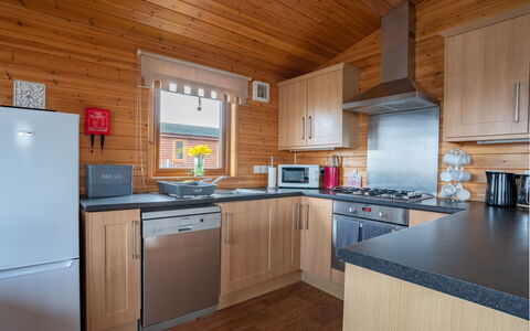 Loch Leven Lodge 12: Cabinetry, Countertop, Kitchen Appliance, Kitchen, Kitchen Stove, Wood, Kitchen Sink, Architecture, Home Appliance, Interior Design