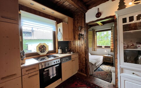 Chalet Bodental 28: Cabinetry, Plant, Window, Wood, Kitchen, Countertop, Interior Design, Architecture, Flooring, Floor