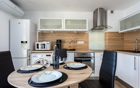 Europa: Cabinetry, Furniture, Property, Countertop, Table, Building, Kitchen Appliance, Chair, Kitchen, Kitchen Stove
