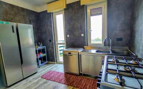 Villa Canonica: Property, Cabinetry, Wood, Kitchen, Flooring, Yellow, Floor, House, Interior Design