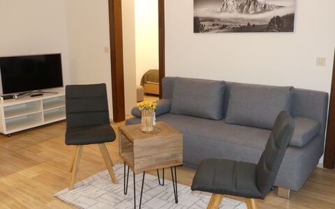 Zell am See 615: Furniture, Couch, Property, Table, Comfort, Wood, Living Room, Interior Design, Building, Flooring