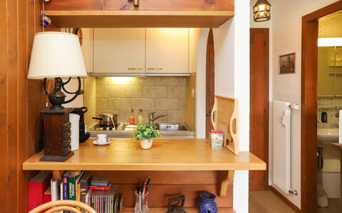 Verbier 231: Property, Furniture, Cabinetry, Table, Wood, Interior Design, Kitchen, Countertop, Living Room, Floor