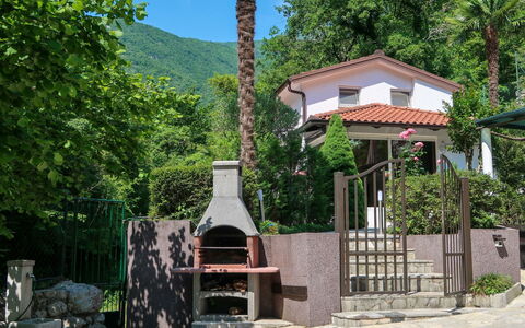 Karin: Property, Sky, Plant, Building, Tree, Shade, Land Lot, Biome, Leisure, Cottage