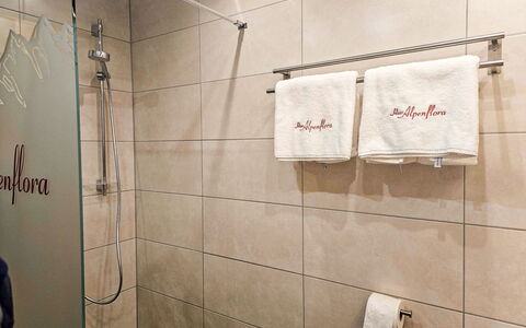Alpenflora: Flooring, Bedroom, Bedding, Bed, Bed Frame, Linens, Bed Sheet, Hardwood, Mattress, Wood Flooring