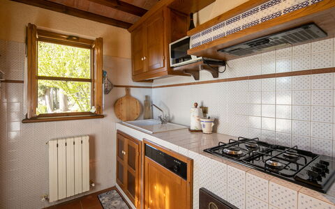 Casa Del Colle: Countertop, Cabinetry, Property, Window, Kitchen Appliance, Gas Stove, Kitchen Stove, Kitchen, Wood, Building