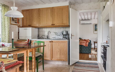Smedstorp: Cabinetry, Countertop, Furniture, Kitchen, Wood, Table, Lighting, Interior Design, Flooring, Floor