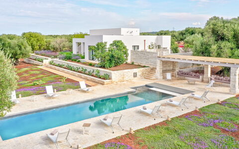 Villa Orama Estia Relais: Sky, Plant, Cloud, Water, Building, Tree, Swimming Pool, Land Lot, Residential Area, Landscape