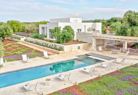 Villa Orama Estia Relais: Sky, Plant, Cloud, Water, Building, Tree, Swimming Pool, Land Lot, Residential Area, Landscape