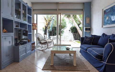 La Terrazza Di Santa Marinella: Furniture, Couch, Comfort, Wood, Studio Couch, Architecture, Interior Design, Picture Frame, Living Room, Flooring