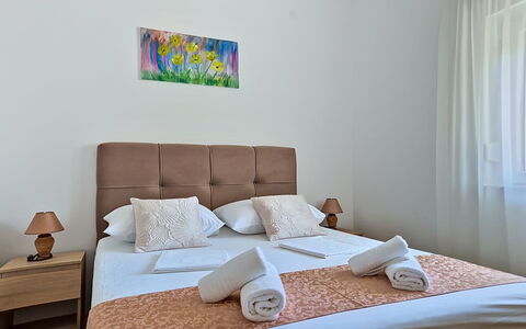 Laura: Bed, Bedroom, Furniture, Bedding, Bed Sheet, Floor, Flooring, Interior Design, Wood, Room